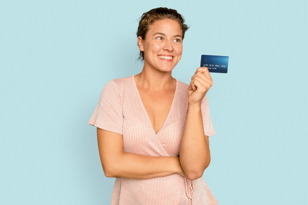Woman Holding Credit Card